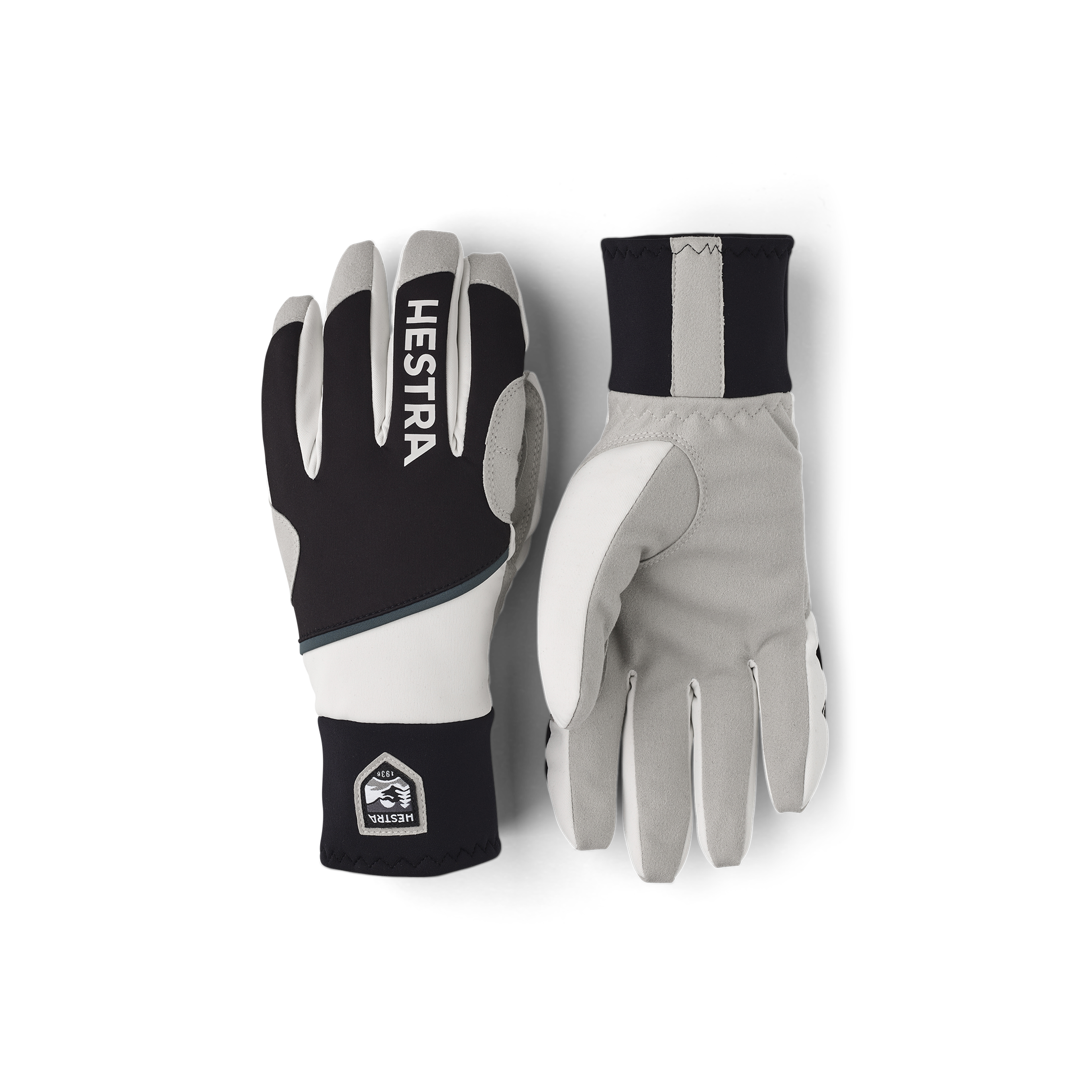Black and white fabric cross-country ski glove with gray synthetic suede palm